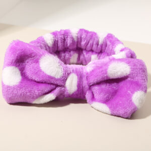 # 10 purple polka dot headbands - single