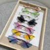 Wholesale New Frameless Dragonfly Diamond PC Sunglasses