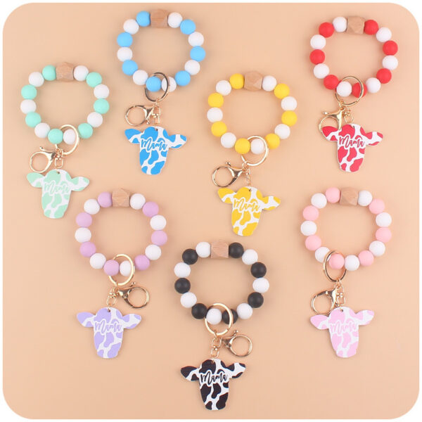 Wholesale Silicone Beads Cartoon Western Style Bull Head Wooden Sign Pendant Bracelet Keychains