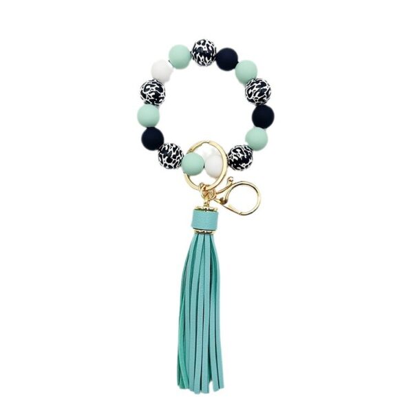 O1CN01Bm4rD41tKvMbZ0i5Y_2207986825884-0-cib Wholesale Leopard Print White Bottom Wooden Beads Rubber Paint Round Beads PU Tassel Bracelet Keychain