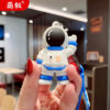 O1CN01C02uyx2BkiaYnGzGh_2210259538377-0-cib Wholesale Cartoon Waving Astronaut Soft Rubber Keychains
