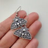 O1CN01C42u3P1EYkzmGRCWY_2215129220364-0-cib Wholesale Gothic Silver Moth-alloy Earrings with Moon and Sun Pattern Alloy Earrings