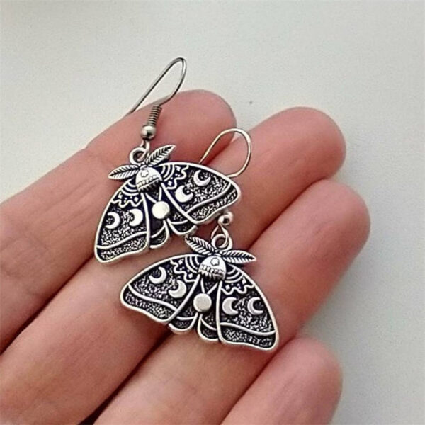 O1CN01C42u3P1EYkzmGRCWY_2215129220364-0-cib Wholesale Gothic Silver Moth-alloy Earrings with Moon and Sun Pattern Alloy Earrings