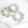 Wholesale Shiny Clover Water Diamond Crown Running Ring Acrylic Beads