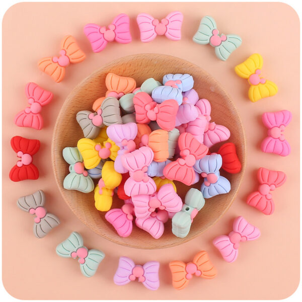 O1CN01C7ugSE1uzyLvU7N3k_3462466109-0-cib Wholesale Baby Cartoon Silicone Animal Bow Teether