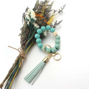 O1CN01CAVw0X1bYW0sGkAM8__2216822363477-0-cib Wholesale Wooden Bead Printed Leather Tassel Bracelet Keychain