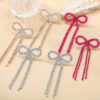 Wholesale Super Flash Claw Chain Bow Tassel Earrings