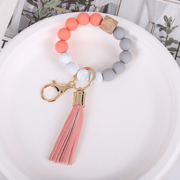 O1CN01CIin1a1FT5ZWPrR3s_2698260487-0-cib-1 Wholesale Tassel Wood Beads Silicone Keychains