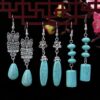 O1CN01CSDbya2CXix93SdhP_2212424078484-0-cib Wholesale Flower Tassel Alloy Earrings