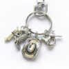 O1CN01CczM9x1nr5YiiTDrR_2212841575142-0-cib-1 Wholesale Alloy Cowboy Hat Keychain