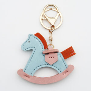 Small wooden horse light blue