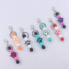 O1CN01Cs2Ajs1NrNgIXnPYE_2214899881623-0-cib Wholesale Cartoon Dog Paw Silicone Handmade Beaded Keychain