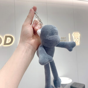 Plush long-legged gray frog