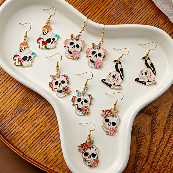 O1CN01D1j1AE1onFkLLSnuj__2059265269-0-cib_108adbc4-a5b3-42a1-a0b5-87716bc7fb01 Wholesale Halloween Rose Skull Funny Crow Butterfly Drop Earrings