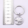 Wholesale Cartoon Simple Drawing Cute Ring Hollow Rhino Stainless Steel Keychain
