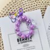 Wholesale Mabei Beaded Plastic Keychain