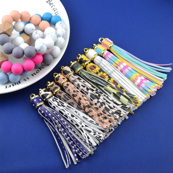 O1CN01DMungv2LADGxx57sQ_2910999651-0-cib Wholesale Leopard Print PU Leather Tassel Printed Pendant Keychain Accessories