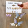 O1CN01DTWGcS29BKlX3pzeG_1007608029-0-cib Wholesale Acrylic Pearl Butterfly Asymmetrical Earrings
