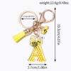 Wholesale Bee Honeycomb Acrylic English Letter Tassel Bee Enamel Keychain