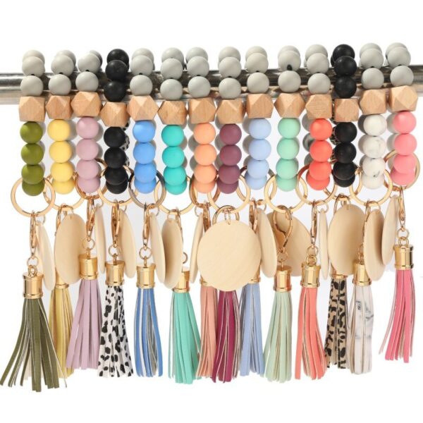 O1CN01EZijCO1b726tLNAkR_2208367413417-0-cib Wholesale Blank Wooden Brand Fringed Silicone Beads Wrist Key Chain