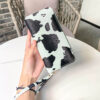 O1CN01EsAuFf1Oh8FibVFmW_3524471736-0-cib Wholesale PU Contrasting Cow Pattern Multi Compartment Wallet Long Horizontal Carrying Bag
