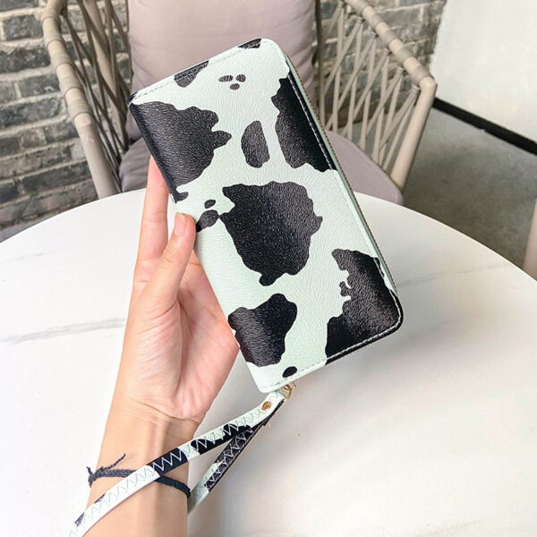O1CN01EsAuFf1Oh8FibVFmW_3524471736-0-cib Wholesale PU Contrasting Cow Pattern Multi Compartment Wallet Long Horizontal Carrying Bag