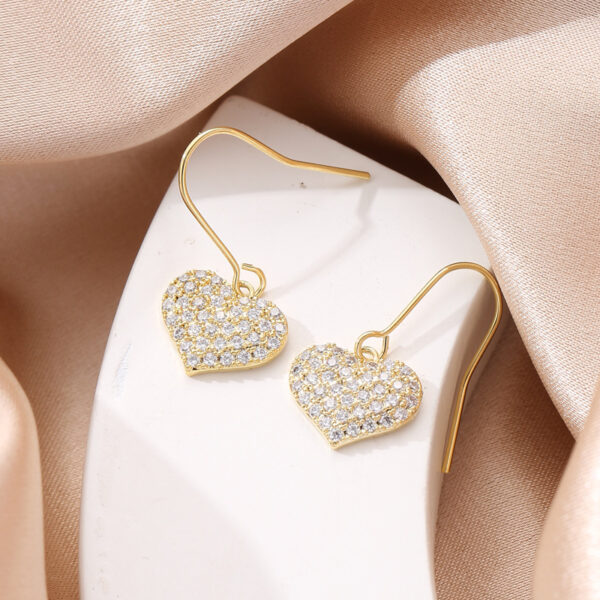 O1CN01F6oJyy24GlROzuGOA_3880997364-0-cib Wholesale Copper Inlaid Zirconia Heart Earrings
