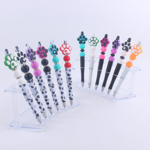 O1CN01Fb0Tk41NrNfKXuetE_2214899881623-0-cib-1 Wholesale Handmade Bead Pen Cartoon Dog Paw Silicone Ballpoint Pen