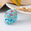 O1CN01FguBGS24ETLs91IXP_2208216907359-0-cib Wholesale Diamond Spray Painted Skull Alloy Keychain