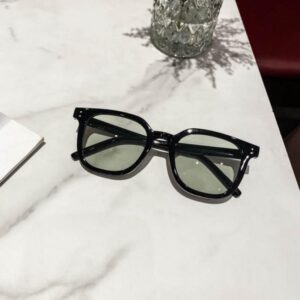 Black frame dark green film