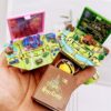 O1CN01G950tT27mJb9CboZF_2201234717839-0-cib Wholesale 3D Stereo Explosive Book Magic World Magic Book Plastic Keychains