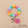 O1CN01GBDOxb1NrNiavJ8jq_2214899881623-0-cib-1 Wholesale Cartoon Apple Teacher Pencil Silicone Beaded Wrist Keychain