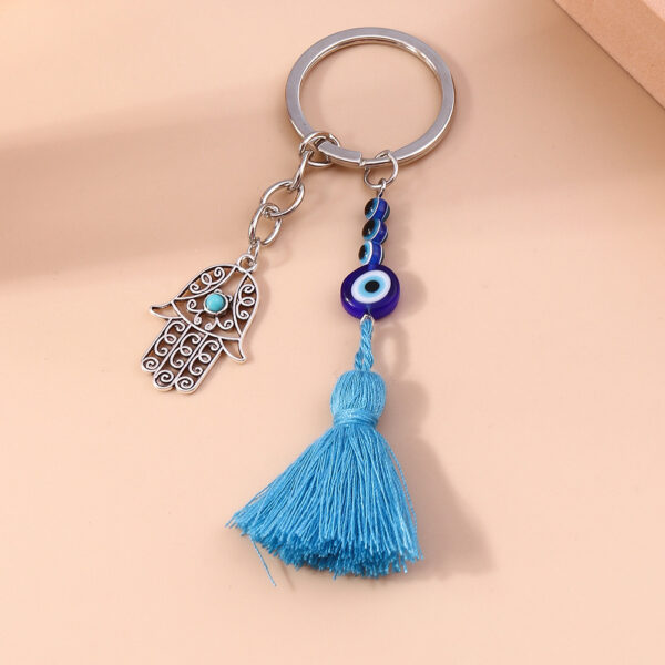 Wholesale Devil's Eye Hollow Palm Tassels Zinc Alloy Keychain
