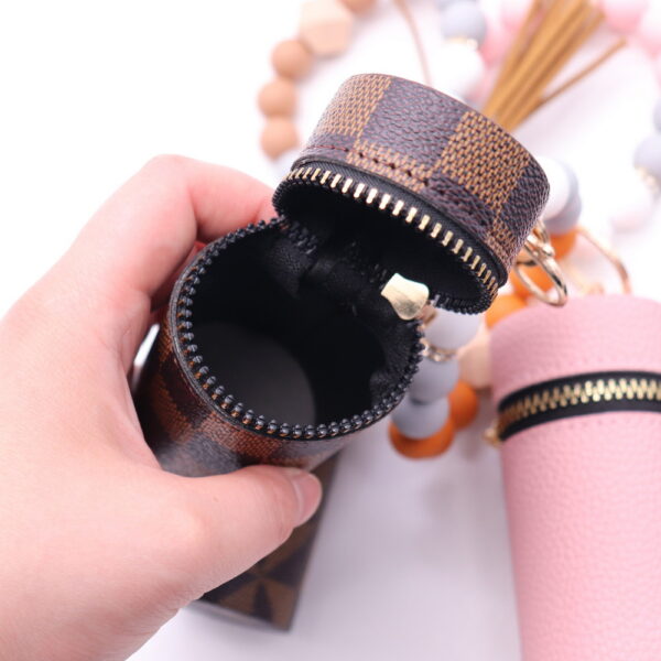 Wholesale Silicone Coin Purse Small Bag Mini Lipstick Earphone Keychain