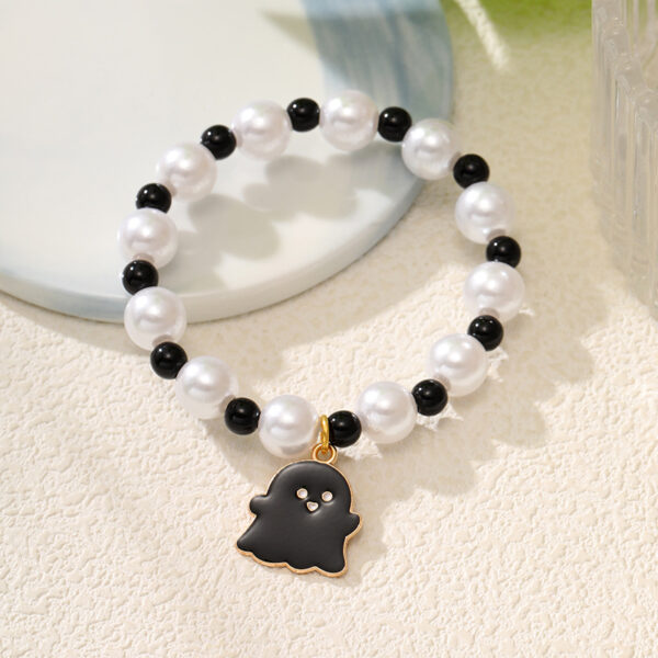 O1CN01GwwzJ227qtej7VBuJ_2200619667849-0-cib Wholesale New Halloween Handmade Beaded Hand Decorated Pumpkin Alloy Bracelet