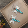O1CN01H0oSYs1qyMbnPF8bv_2206372095564-0-cib Wholesale Bohemian Vintage Natural Turquoise Dragonfly Alloy Earrings