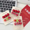 O1CN01HBqgaL2DuunCcTXaM_2212929498670-0-cib Wholesale Cute Simulated Candied Haws Food Hairpin