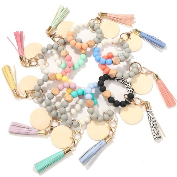 O1CN01HEg54i1b726sXSfxy_2208367413417-0-cib Wholesale Blank Wooden Brand Fringed Silicone Beads Wrist Key Chain