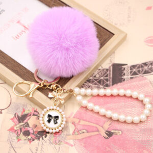 O1CN01HMlumX1X3abMGZWhc__2038122868-0-cib Wholesale Imitation Rex Rabbit Fur Ball Pearl Chain Bow Plush Ball Keychain