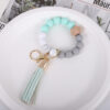 O1CN01HMsLoE1FT5ZVsMHvd_2698260487-0-cib Wholesale Tassel Wood Beads Silicone Keychains
