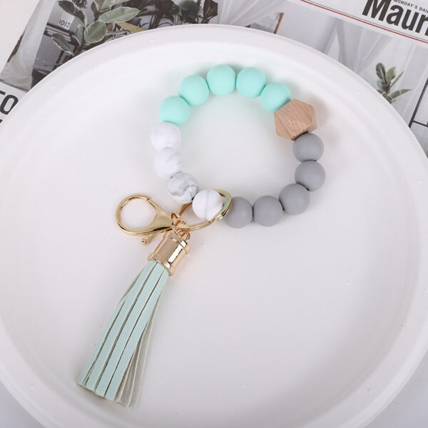 O1CN01HMsLoE1FT5ZVsMHvd_2698260487-0-cib Wholesale Tassel Wood Beads Silicone Keychains