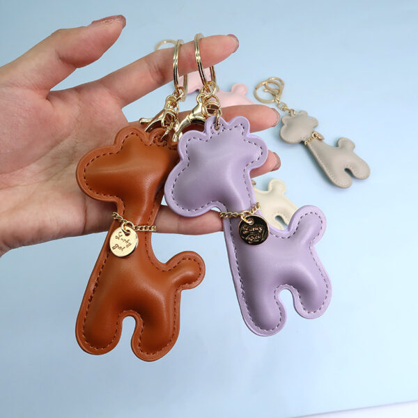 O1CN01HNkIoI24iFBNdLE1C_2208109567424-0-cib-2 Wholesale Giraffe PU Cartoon Keychain