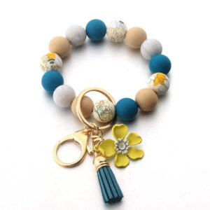 O1CN01HQkWzy1bYW0rW1Eio__2216822363477-0-cib Wholesale Silicone Leather Tassel Sunflower Keychain