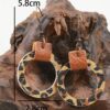 O1CN01HTvtRi2HKyM4nlHSK_3294559133-0-cib Wholesale Flower Leopard Print Abstract Painting Graffiti Hollow Circular Leather Earrings
