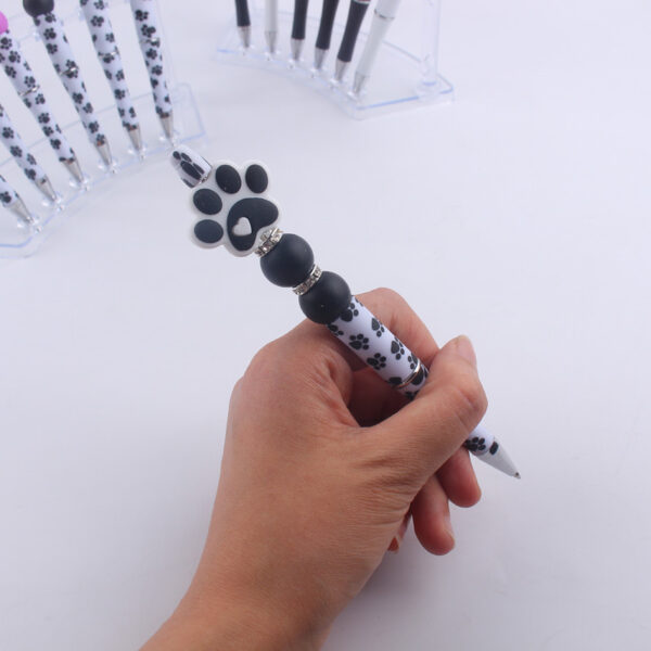 O1CN01HYPxDd1NrNfLsQyZe_2214899881623-0-cib-1 Wholesale Handmade Bead Pen Cartoon Dog Paw Silicone Ballpoint Pen