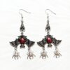 O1CN01HZQw6i1VaRqbi3MgJ_2212758802669-0-cib Wholesale Gothic Evil Upside Down Red Oil Drip Bat Pendant Earrings