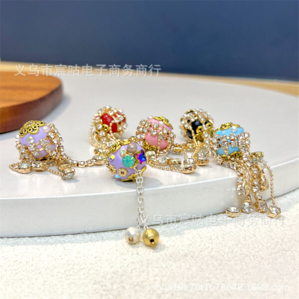 O1CN01Ho5QJK1g1bbA7ydmJ_2215525424082-0-cib Wholesale Rhinestone Tassel Alloy Loose Beads