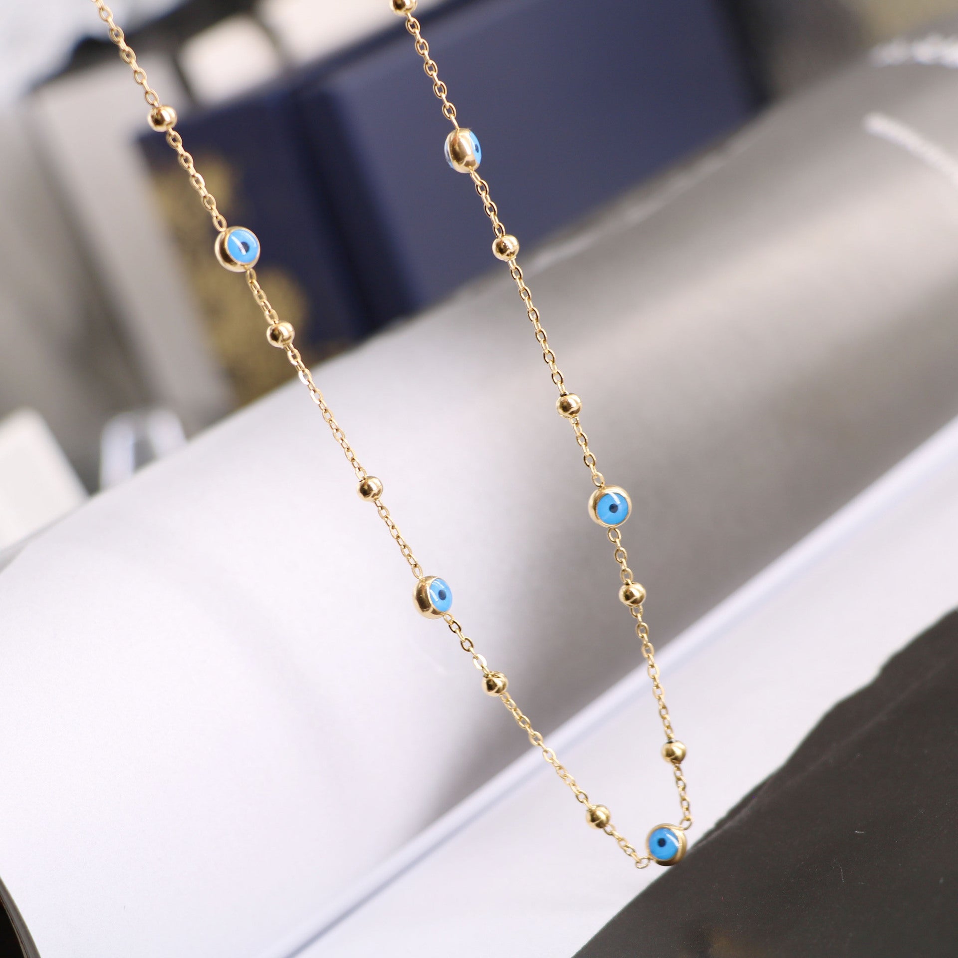 Wholesale Devil's Eyes Dark Blue Eyes Small Steel Balls ing Titanium Steel Necklaces