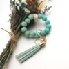 Wholesale Wooden Bead Printed Leather Tassel Bracelet Keychain