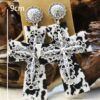 Wholesale of Western Wind Cow Pattern Turquoise Alloy Horseshoe Leopard Pattern Cross Leather Earrings